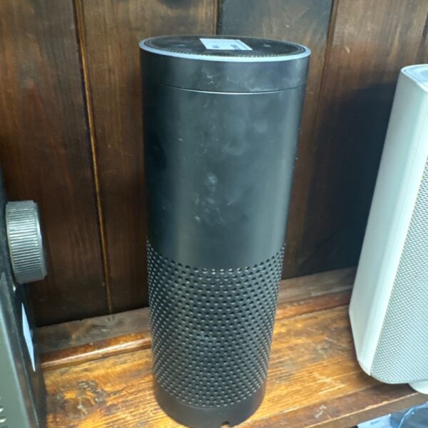 Black Amazon Echo Plus (1st Generation) smart speaker on a wooden surface.