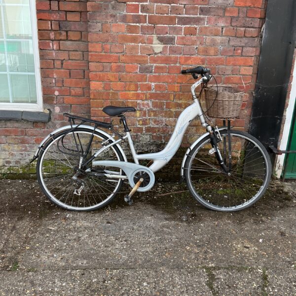 Silver Ammaco Canterbury ladies bicycle with accessories.