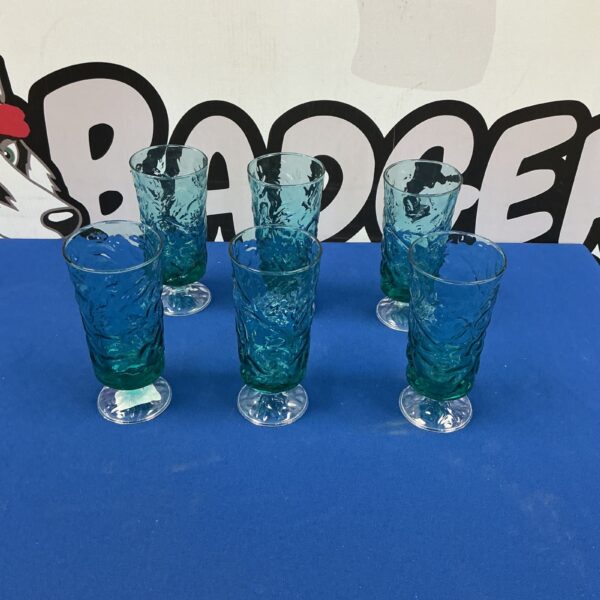 Set of four teal Anchor Hocking Milano glasses, vintage mid century style.
