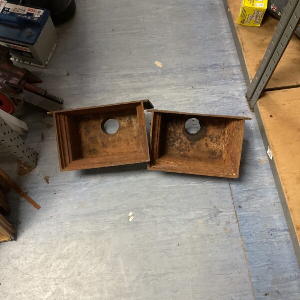 Antique cast iron rainwater hopper for Victorian building drainage.