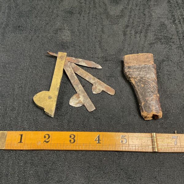 Antique fleam instrument for phlebotomy, a historical medical tool.