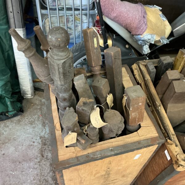 Antique furniture parts from Wycombe museum, weathered wood carvings.