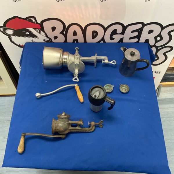 Antique hand crank mincer, a vintage kitchen tool.