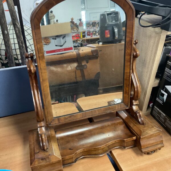 Antique mahogany dressing table mirror with shaped frame.