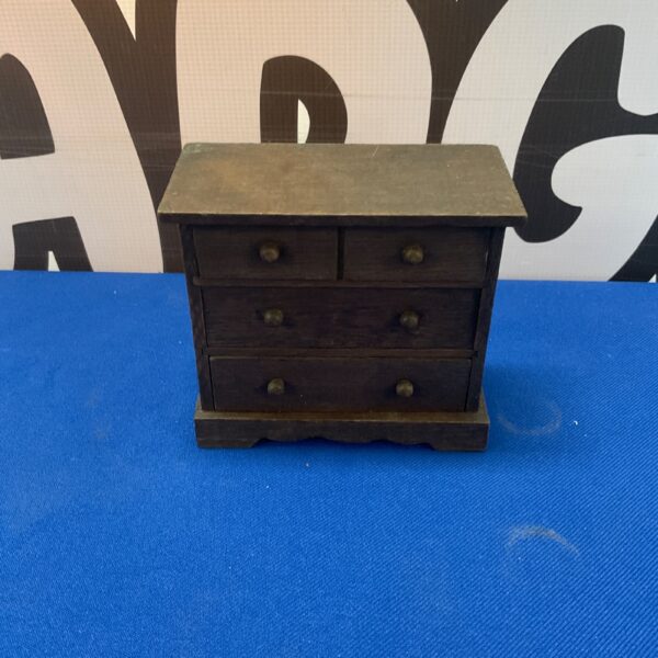 Antique miniature Victorian mahogany chest of drawers.