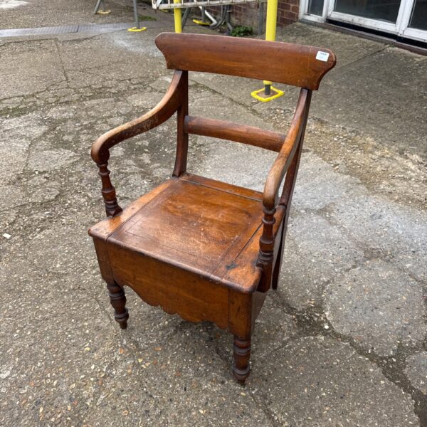 Antique oak commode chair with sealed seat, 19th century.