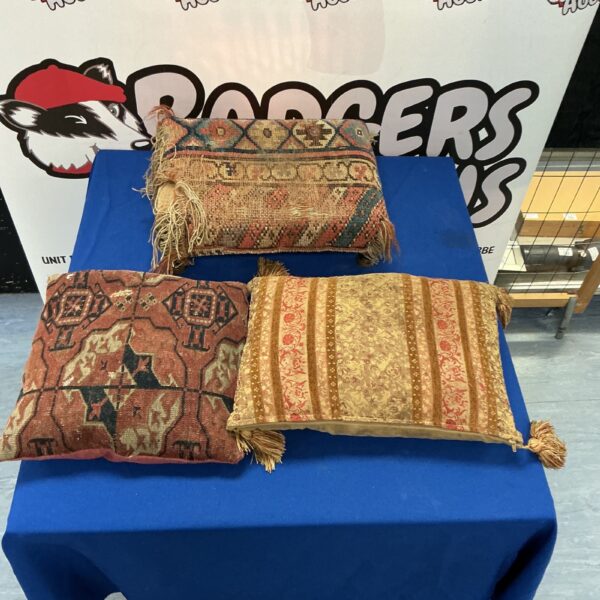 Antique prayer cushions with intricate embroidery, a beautiful Islamic art collectible.