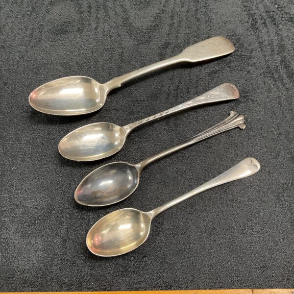 Vintage silver teaspoons in a lot, antique flatware collection.