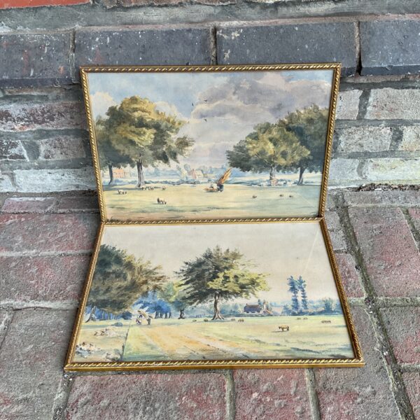 Antique watercolour painting of sheep in a rural landscape with gilt frame.