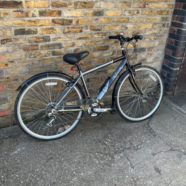 Side view of an Apollo Highway bike, a men's hybrid bicycle.