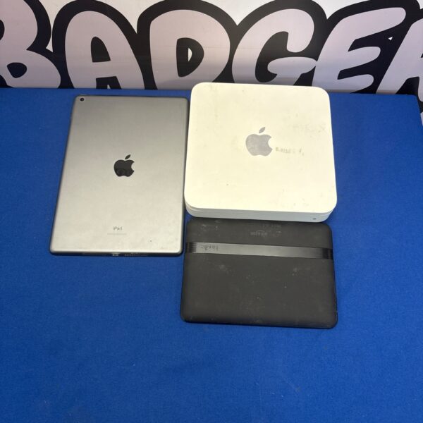Apple iPad, Time Capsule, and Kindle bundle for collectors.