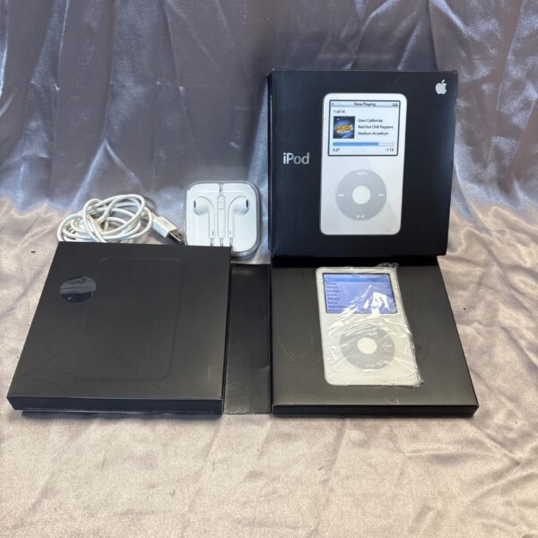Boxed Apple iPod 32GB with charger and headphones.