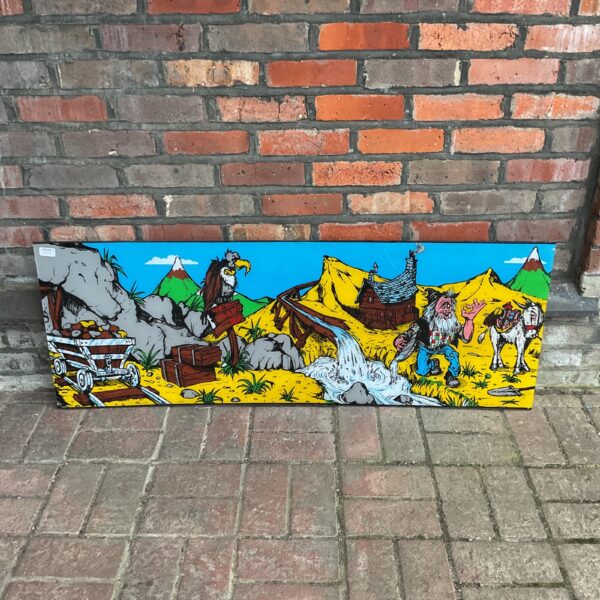 Vintage arcade prospector art panel with cartoon prospector and donkey.