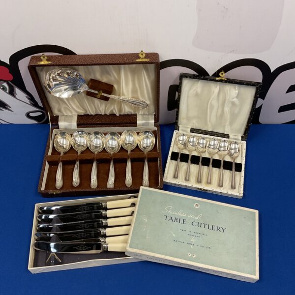 Vintage Arthur Price cutlery sets in original presentation boxes.