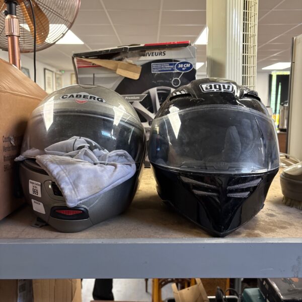 Pair of AVG and Caberg full-face motorcycle helmets for sale.