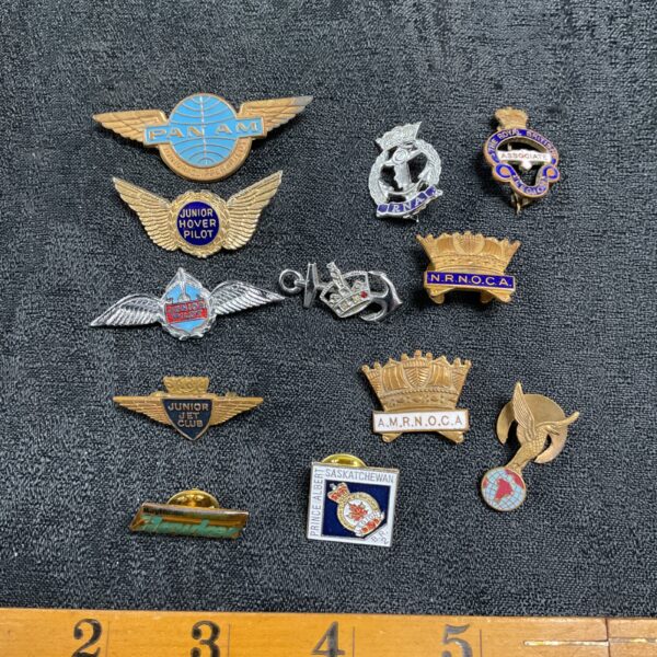 Vintage aviation and navy pin badges collection for collectors.