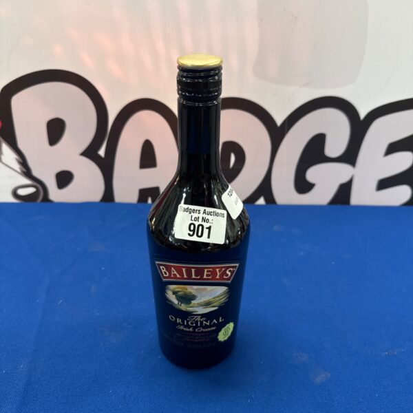 Sealed bottle of Baileys Irish Cream liqueur with expiration date.
