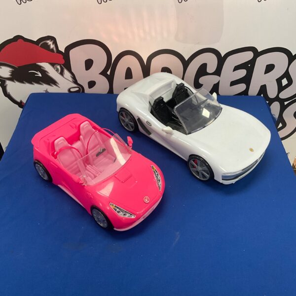 Pink and rainbow Barbie car for imaginative play and collecting.