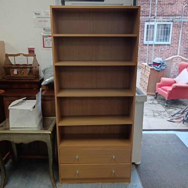 Beech effect bookcase with two drawers, ideal for home storage.
