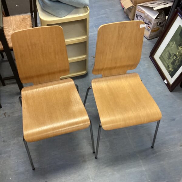 Pair of vintage bentwood chairs with metal legs.