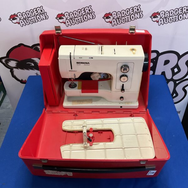 Vintage Bernina Record electronic sewing machine in its case.