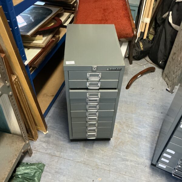 Vintage Bisley filing cabinet with multiple metal drawers.