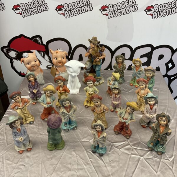 Vintage bisque porcelain figurine collection including Pinky & Perky.