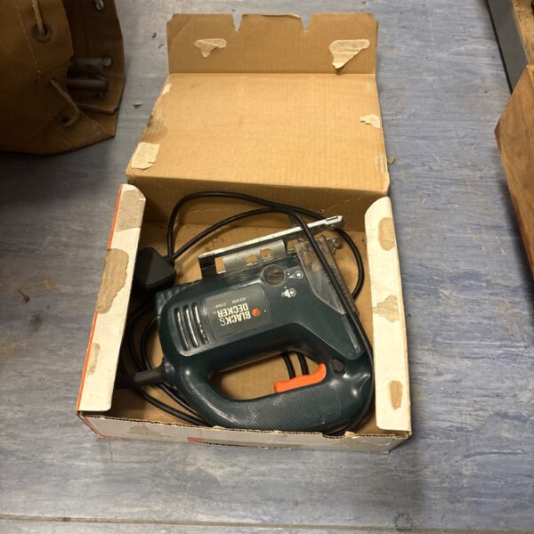 Vintage Black and Decker jigsaw power tool in as-found condition.