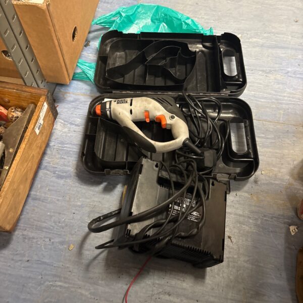 Vintage Black and Decker hammer drill with Trekker battery charger.