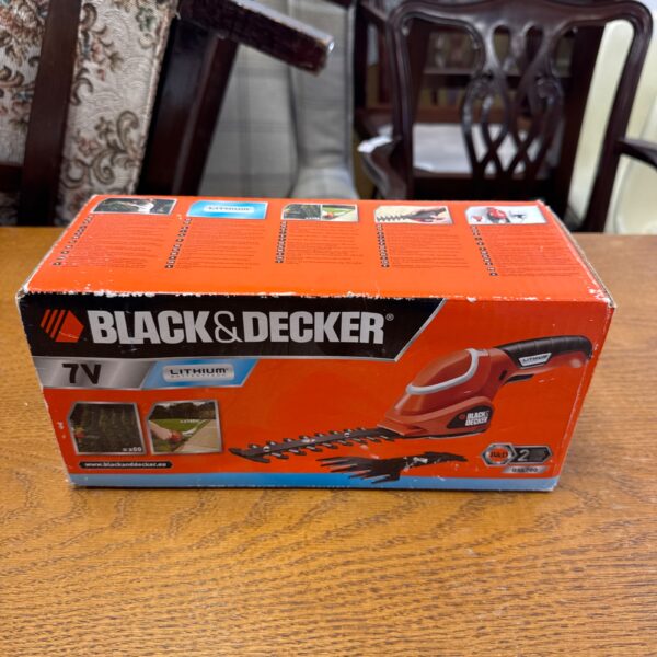 Sealed Black & Decker 7V Lithium hedge pruner in original packaging.