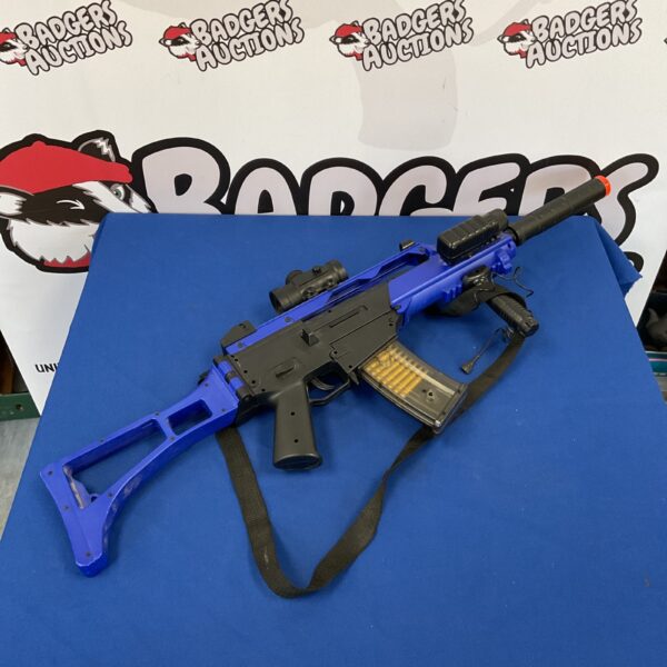 Bright blue plastic airsoft rifle replica for toy play.