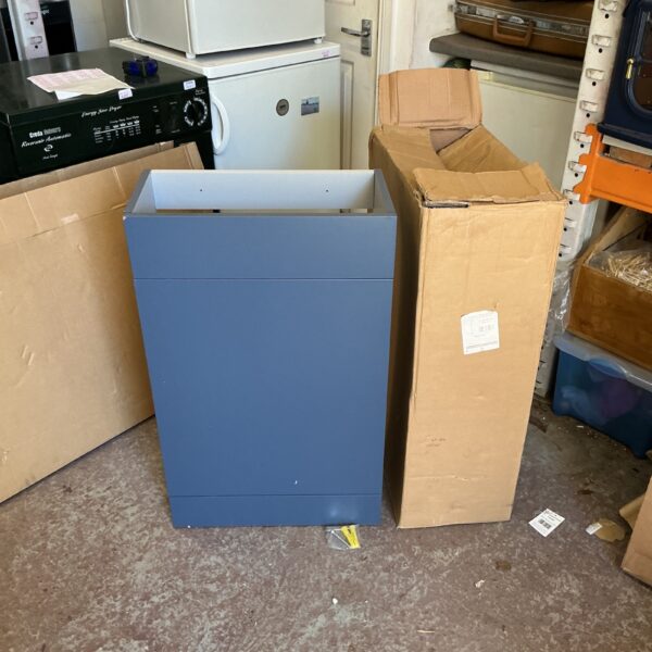 Blue WC unit for bathroom storage and cistern housing.