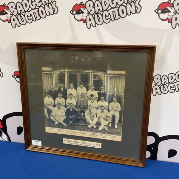 Vintage 1931 photograph of the Booker Cricket Club team in cricket whites.