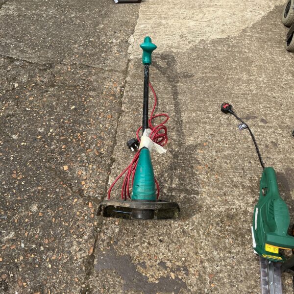 Used Bosch electric garden strimmer for lawn and garden maintenance.