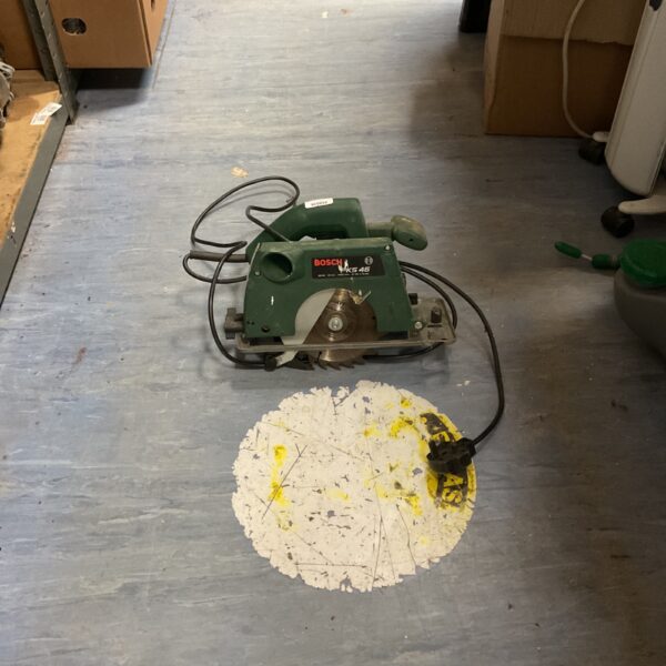 Vintage Bosch PKS 46 electric circular saw for woodworking.
