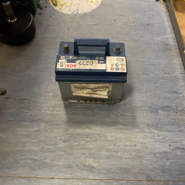 Vintage Bosch S4006 car battery for automotive restoration.