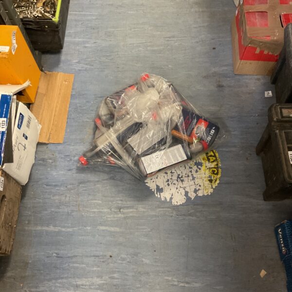 Sealed bag of Bostick Cementone mortar plasticiser for construction.
