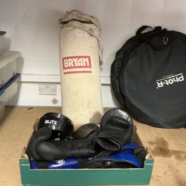 Bryan punch bag kit with boxing gloves and training equipment.