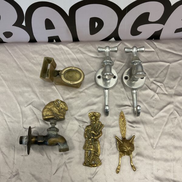 Vintage brass field mouse tap with Scottish piper and fox door knocker.
