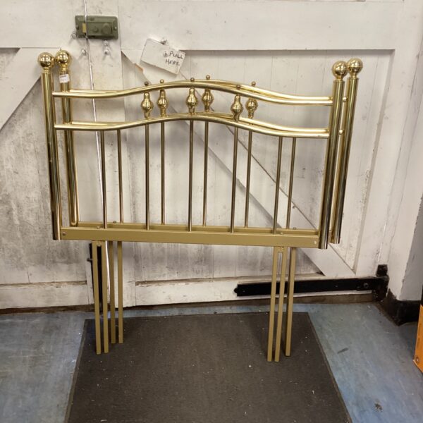Vintage brass single bed headboard pair for bedroom decor.
