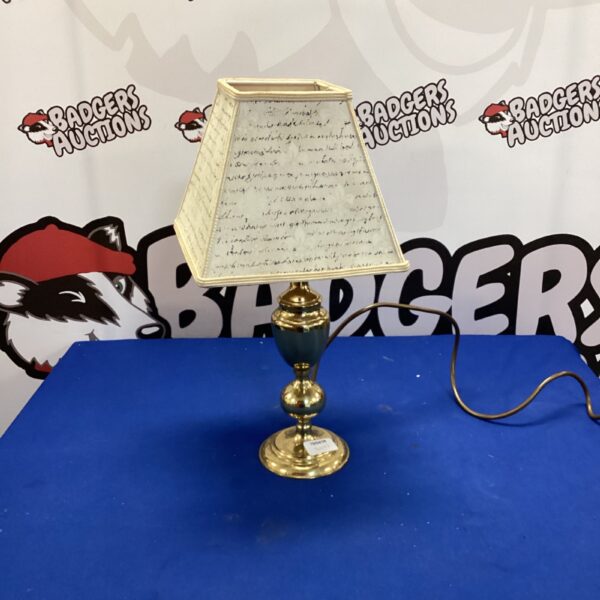 Vintage brass table lamp with fabric shade.