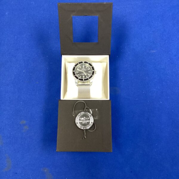 Front view of a Breitling gents wrist watch in a display box.