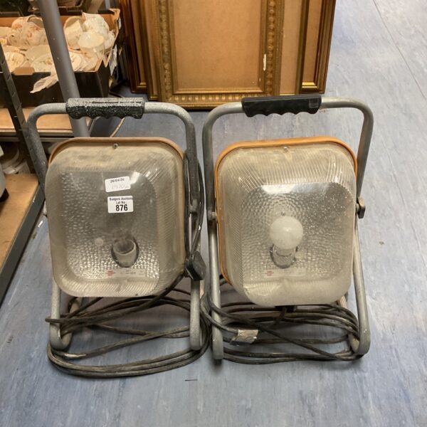 Two Brennenstuhl outdoor lights with metal cages and carry handles.