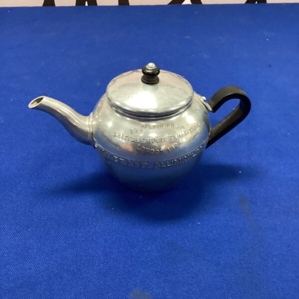 Vintage British Empire Exhibition swan teapot, silver plated collectible.