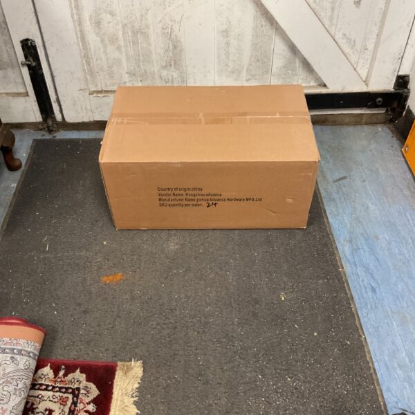 Box of brushed nickel bow handles for cabinets and drawers.