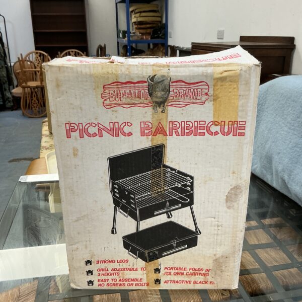 Vintage Buffalo picnic barbecue, a portable enamel grill.
