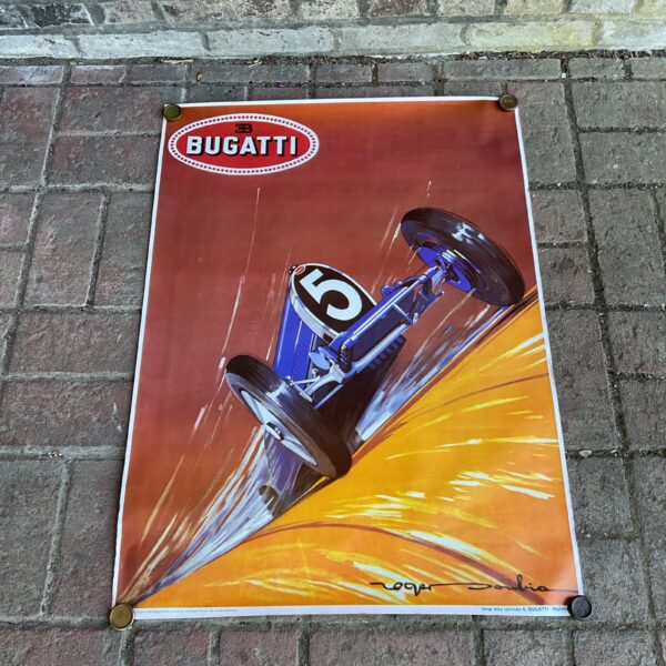Vintage reproduction Bugatti racing poster featuring a classic car.