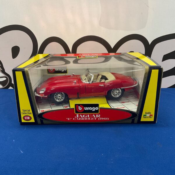 Red Burago 1:43 Jaguar E Type Cabriolet diecast model car.