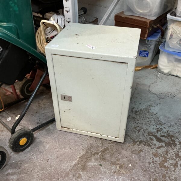 Vintage Burton floor safe with keys, ideal for collectors.
