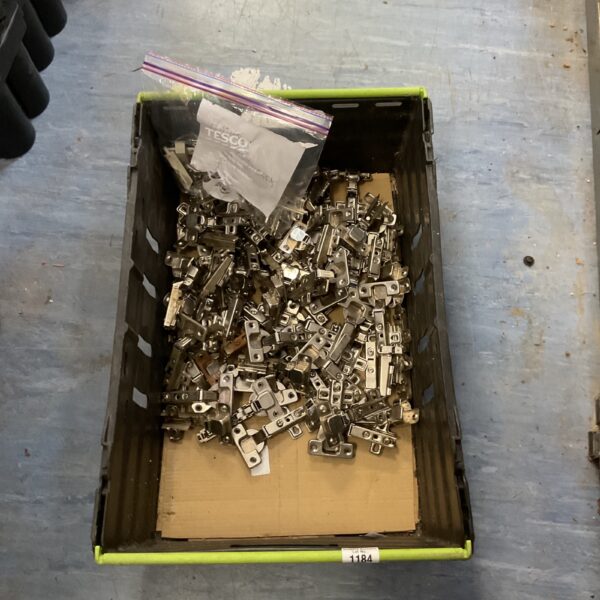 Crate filled with a large quantity of concealed cabinet hinges.